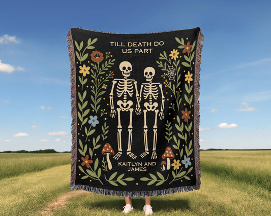 Premium woven cotton blanket showcasing kawaii skeleton couple, happy Halloween typography, whimsigoth aesthetic with whimsigoth kawaii skeleton couple with happy Halloween celebration theme, featuring decorative fringe and soft tapestry texture